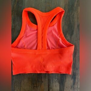 Free people movement tank adorable and love the bright color